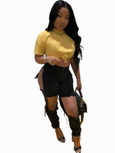 Pantalones ajustados de mezclilla con cintura alta y cortes